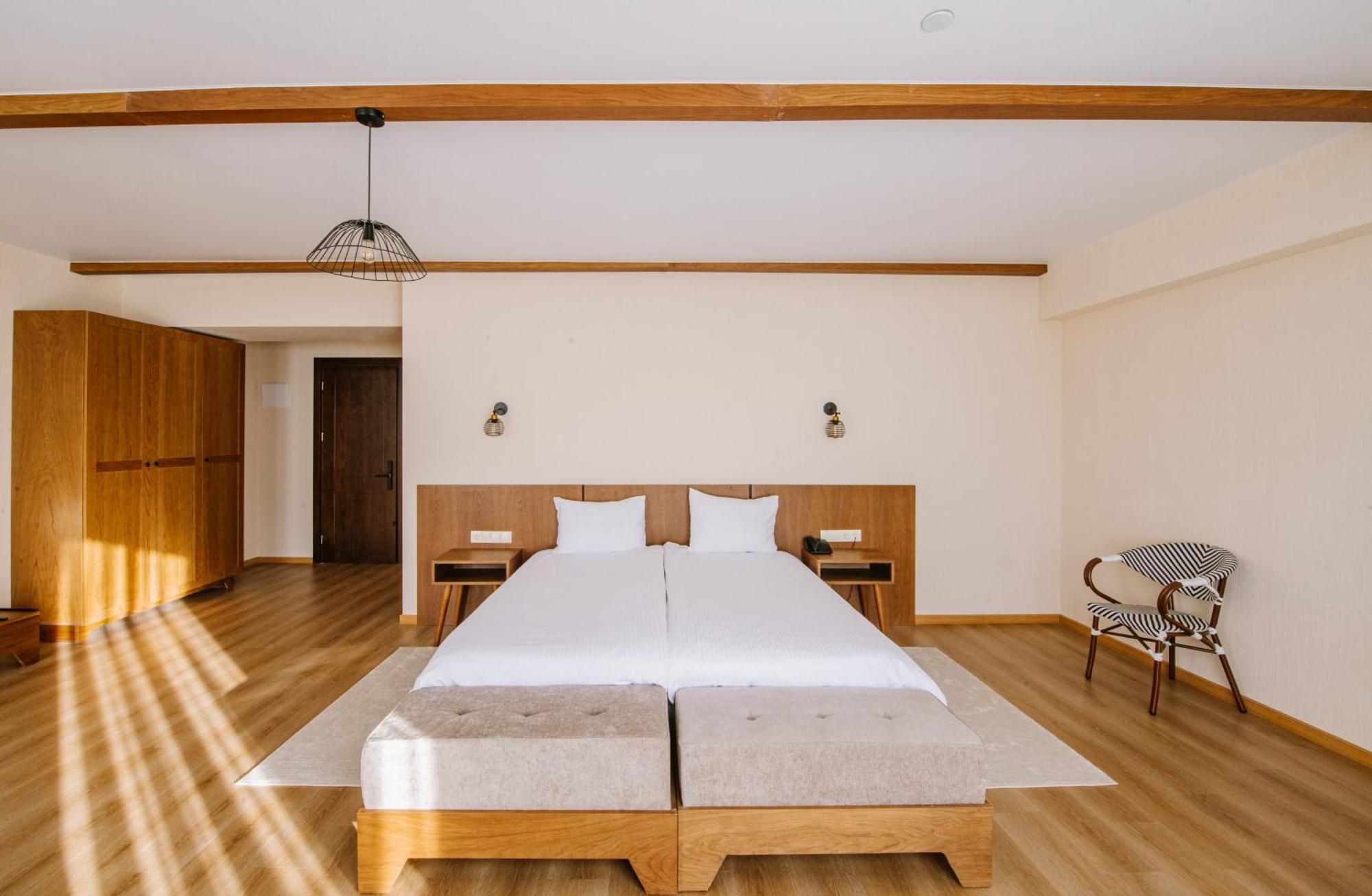 Gudauri Inn Δωμάτιο φωτογραφία A bedroom at the hotel